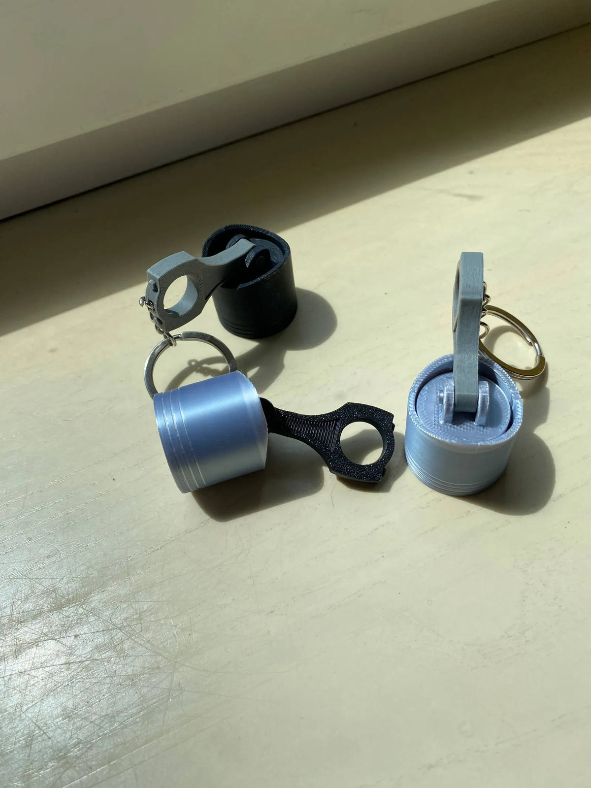 Piston Clicker Keychain