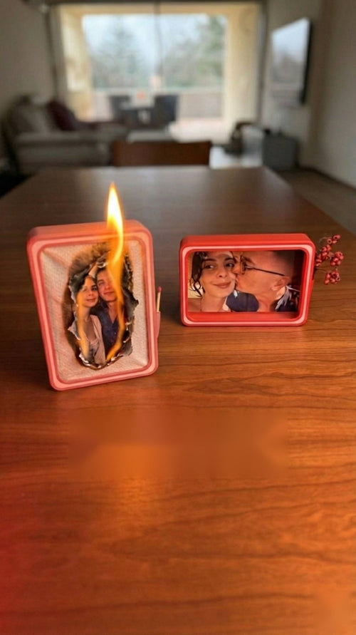 Flame Reveal frame with the paper burning away to show a photo