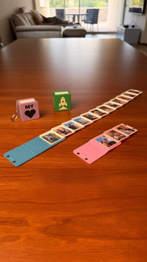 Key Book pages unfolded into a strip of mini photos